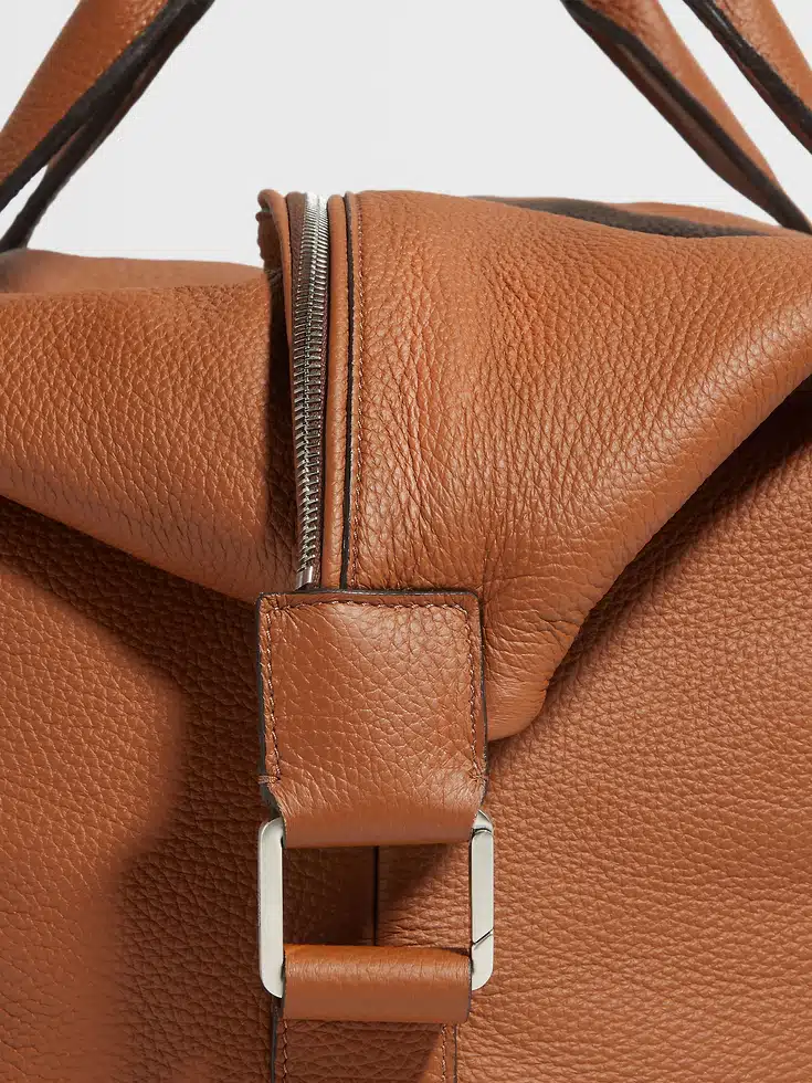 Borsa da viaggio in pelle di daino con motivo a fogliame, raglan Borsa da viaggio in pelle di daino con motivo a fogliame, raglan