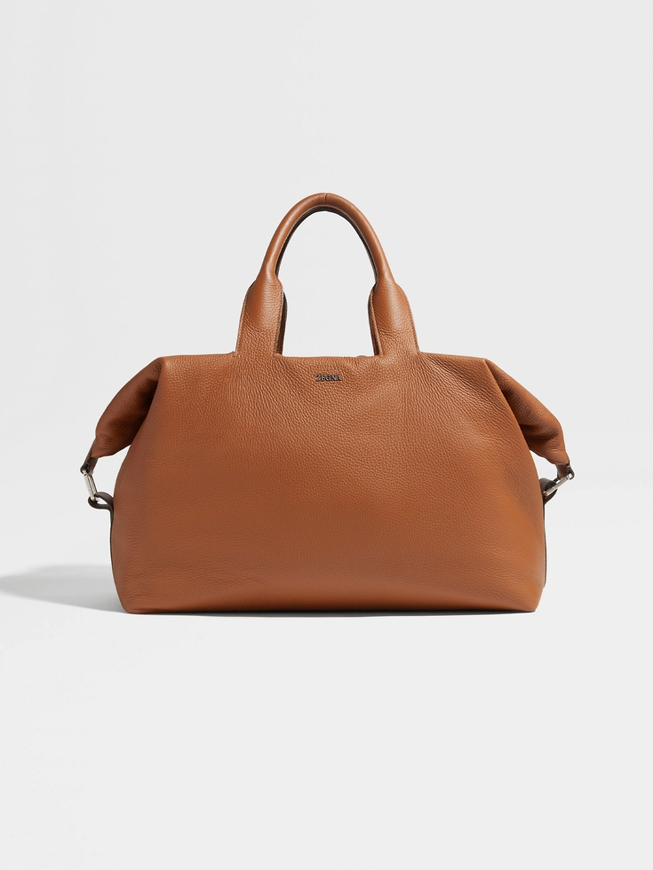 Borsa da viaggio in pelle di daino con motivo a fogliame, raglan