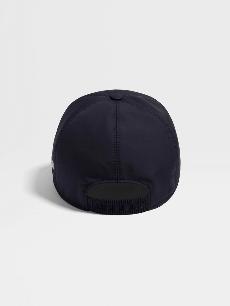 Cappellino da baseball in tessuto tecnico blu scuro Cappellino da baseball in tessuto tecnico blu scuro