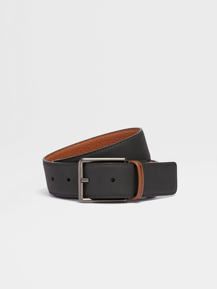 Cintura reversibile in pelle nera e con motivo a foglie Cintura reversibile in pelle nera e con motivo a foglie