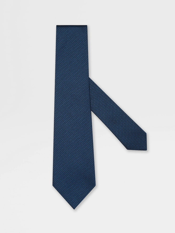 Cravatta in seta blu turchese brillante