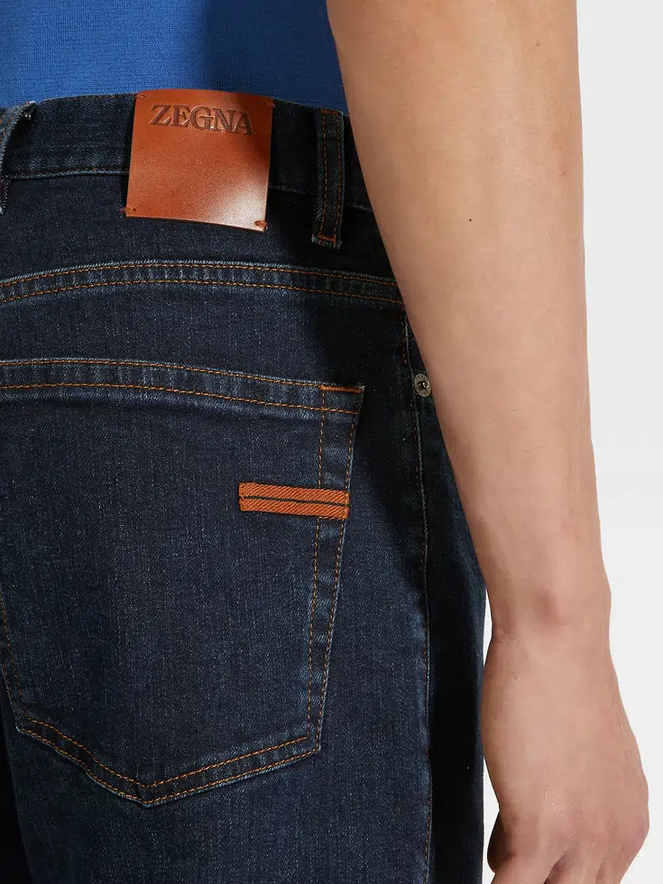 Jeans Roccia in cotone elasticizzato blu scuro risciacquato