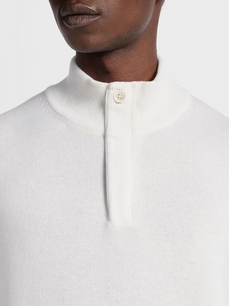 Maglione a collo alto con zip in cashmere Oasi bianco mélange Maglione a collo alto con zip in cashmere Oasi bianco mélange
