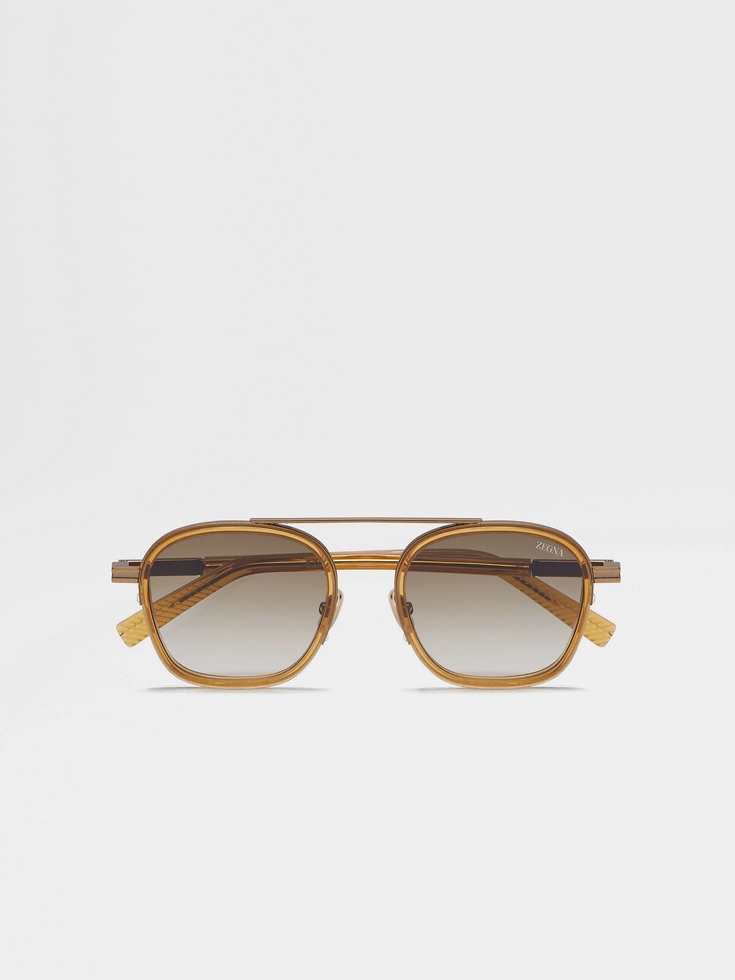 Occhiale da sole Orizzonte I in acetato e metallo color oro trasparente