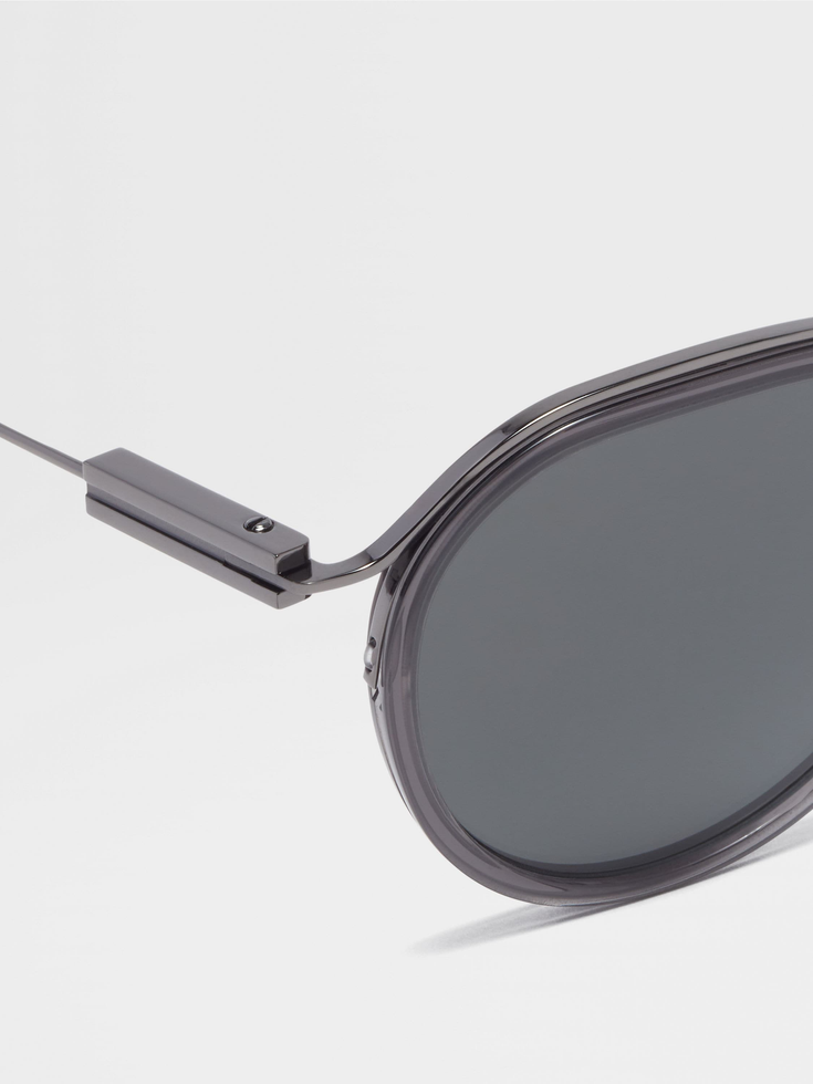 Occhiali da sole in acetato e metallo grigio trasparente e rutenio scuro