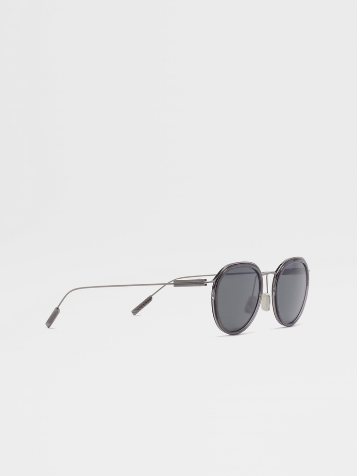 Occhiali da sole in acetato e metallo grigio trasparente e rutenio scuro Occhiali da sole in acetato e metallo grigio trasparente e rutenio scuro