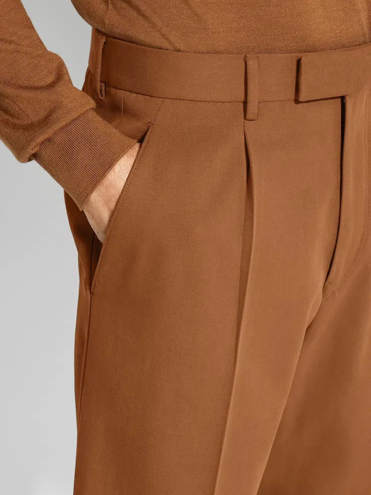 Pantaloni in cotone e lana con fogliame scuro