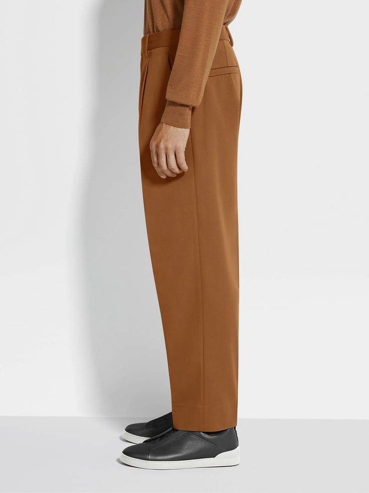 Pantaloni in cotone e lana con fogliame scuro Pantaloni in cotone e lana con fogliame scuro