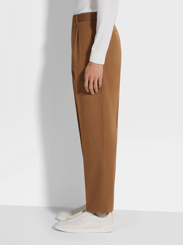 Pantaloni in cotone e lana con fogliame scuro Pantaloni in cotone e lana con fogliame scuro