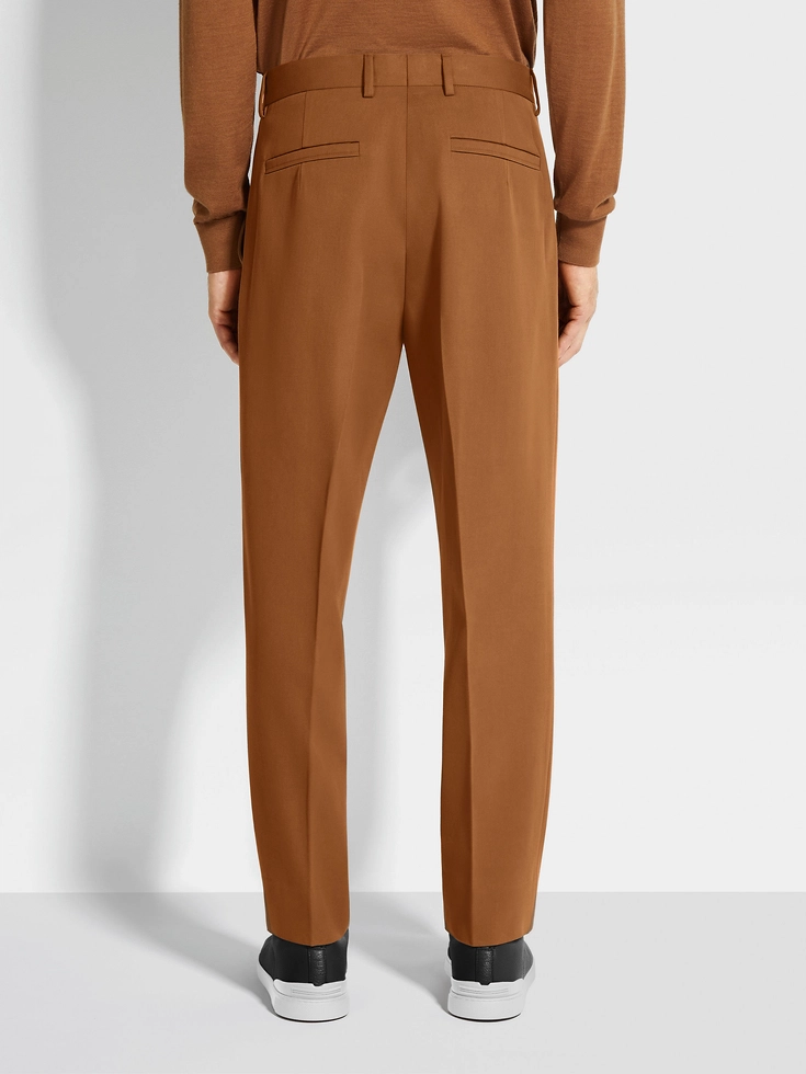 Pantaloni in cotone e lana con fogliame scuro Pantaloni in cotone e lana con fogliame scuro