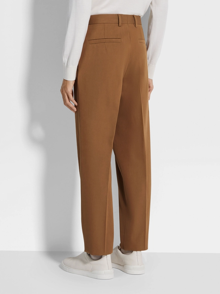 Pantaloni in cotone e lana con fogliame scuro Pantaloni in cotone e lana con fogliame scuro