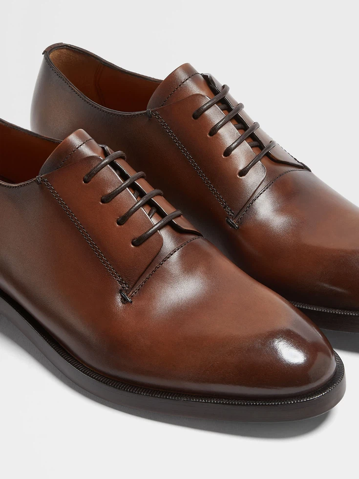 Scarpe Derby Torino in pelle marrone chiaro Scarpe Derby Torino in pelle marrone chiaro