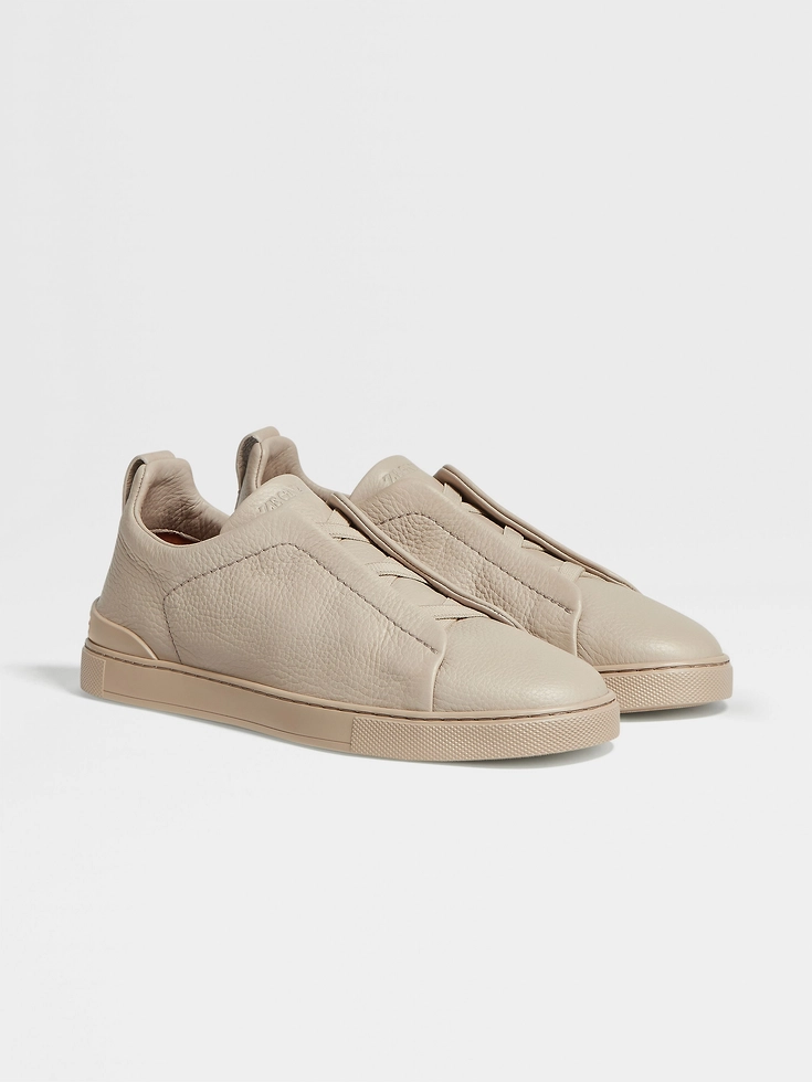 Sneakers Triple Stitch™ in pelle di daino beige